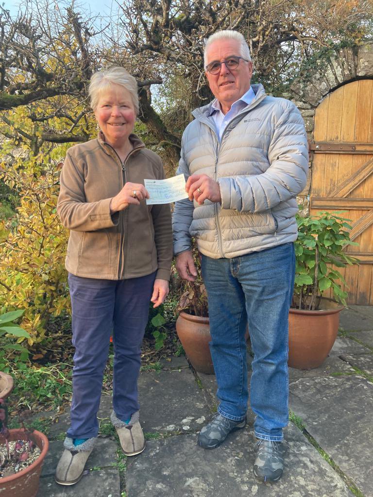 Many thanks to Charles Harper from Abergavenny Rotary Club - seen here presenting a cheque for £900 to the chair of Abergavenny Town of Sanctuary.