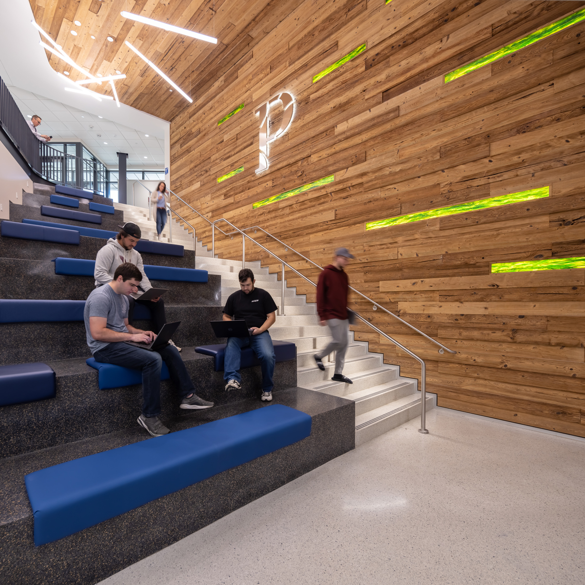 The University of Wisconsin-Platteville's atrium seamlessly blends contemporary design with antique elements by incorporating reSAWN TIMBER co.'s REED reclaimed Hemlock. 
+
Architect: BWBR Solutions
Photographer: Brandon Stengel