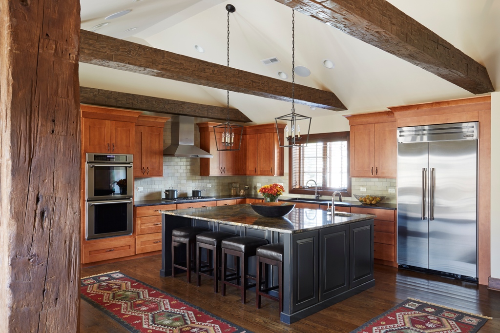 This rustic great room with a huge island is perfect for a large Thanksgiving gathering with family and friends. Bring on the turkey!

Photos #michaelakaskel

#rustickitchen #customcabinetry #kitchendesign #greatroom #homeentertaining