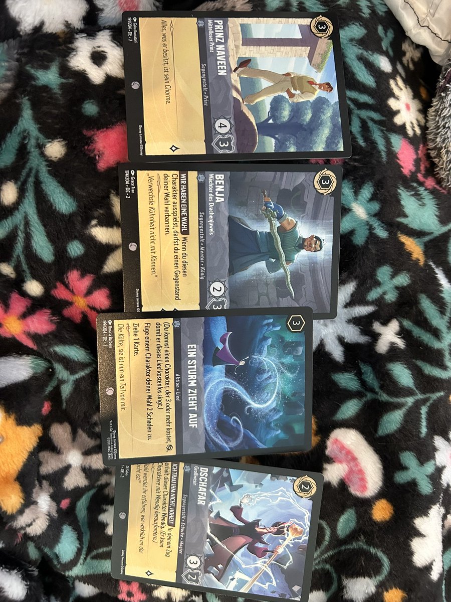jen_3ddy's tweet photo. @DisneyLorcana @RavensburgerUK the disappointment when you open your UK Floodborn booster packs on release day to find 4 German versions have made their way into 4 separate packs instead. Any chance of rectifying this pretty please? 🤞🏼#DisneyLorcana #floodborn https://t.co/I2cWB7rhMH