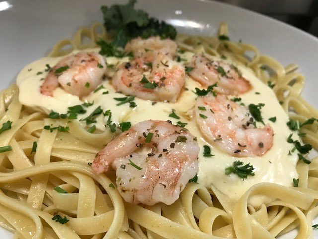 Join us tonight at Capponi’s for: 
-clam chowder
-shrimp, scallops, &amp; mushrooms in dill sauce over linguini 
-All you can eat fried walleye fillets
(Pictured: fettuccini in our homemade alfredo with shrimp)

Call (815)452-2343 from 4:30-9:30 for carryout; full menu is available