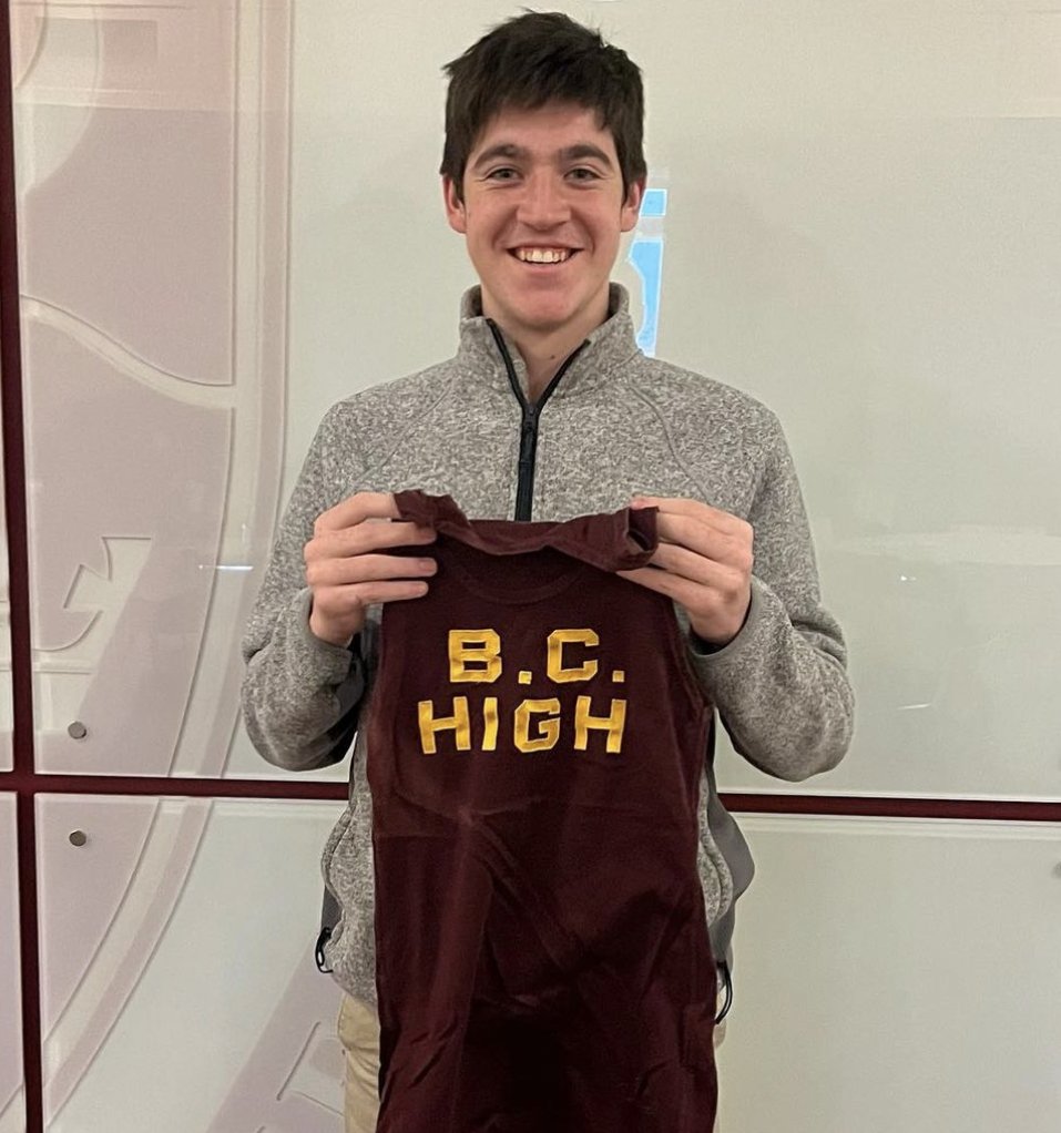 BCHigh's tweet image. John Quirk ’69 has held the record for the fastest mile time in #BCHigh Track history until last year when superstar runner, Chris Larnard ’24, claimed that record for himself. Over 50 years later, Quirk humbly passed his record-breaking jersey over to Larnard. AMDG 🦅