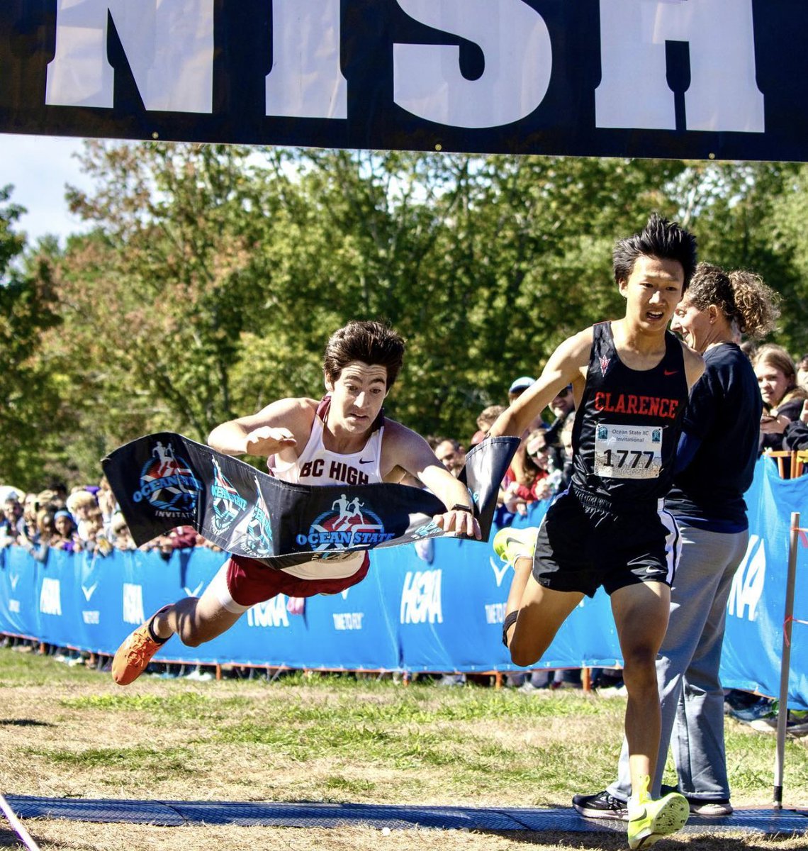 BCHigh's tweet image. John Quirk ’69 has held the record for the fastest mile time in #BCHigh Track history until last year when superstar runner, Chris Larnard ’24, claimed that record for himself. Over 50 years later, Quirk humbly passed his record-breaking jersey over to Larnard. AMDG 🦅