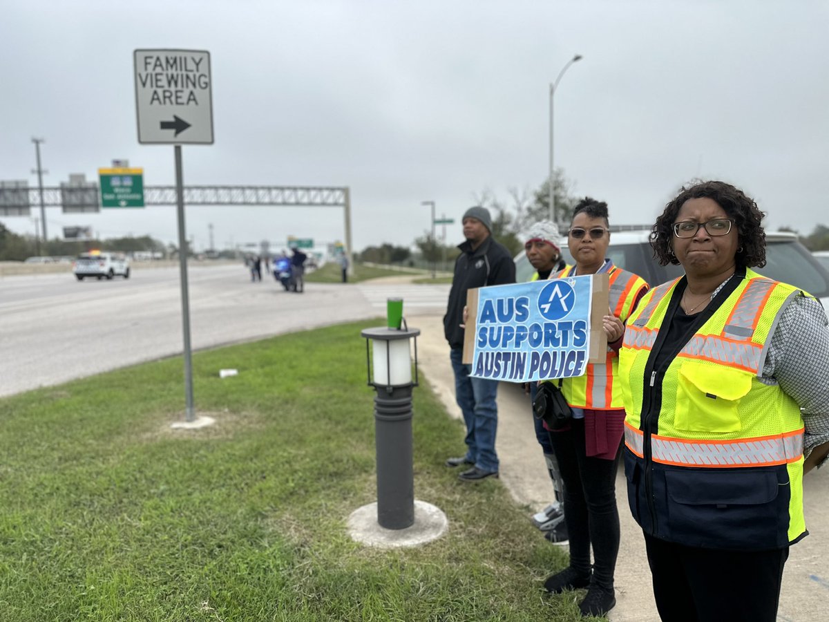 AustinAirport's tweet photo. Officer Pastore’s procession is currently passing in front of AUS in eastbound HWY 71. Our team members have lined up to pay respects to our community’s fallen hero. https://t.co/oaUix9YdUE