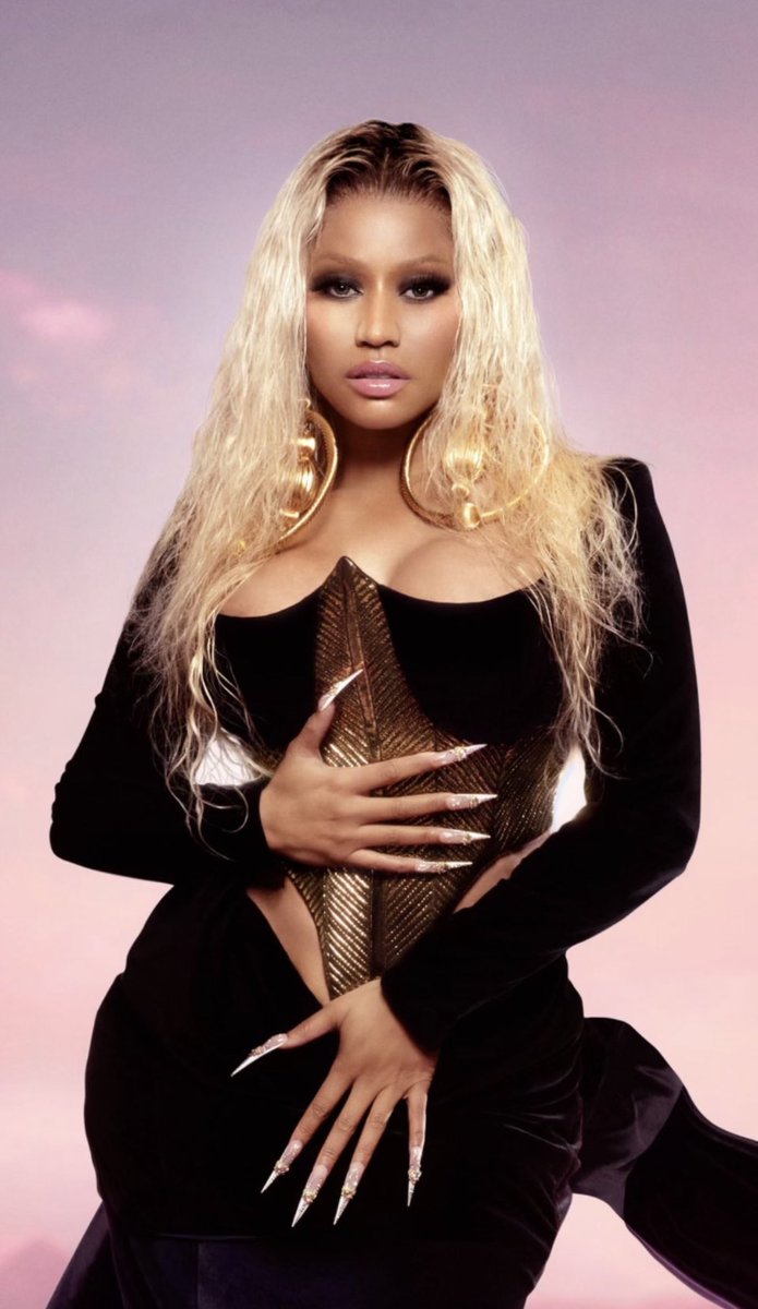 Nicki Minaj looks ethereal for the 'Pink Friday 2' album cover shoot. Nicki Minaj looks ethereal for the 'Pink Friday 2' album cover shoot.