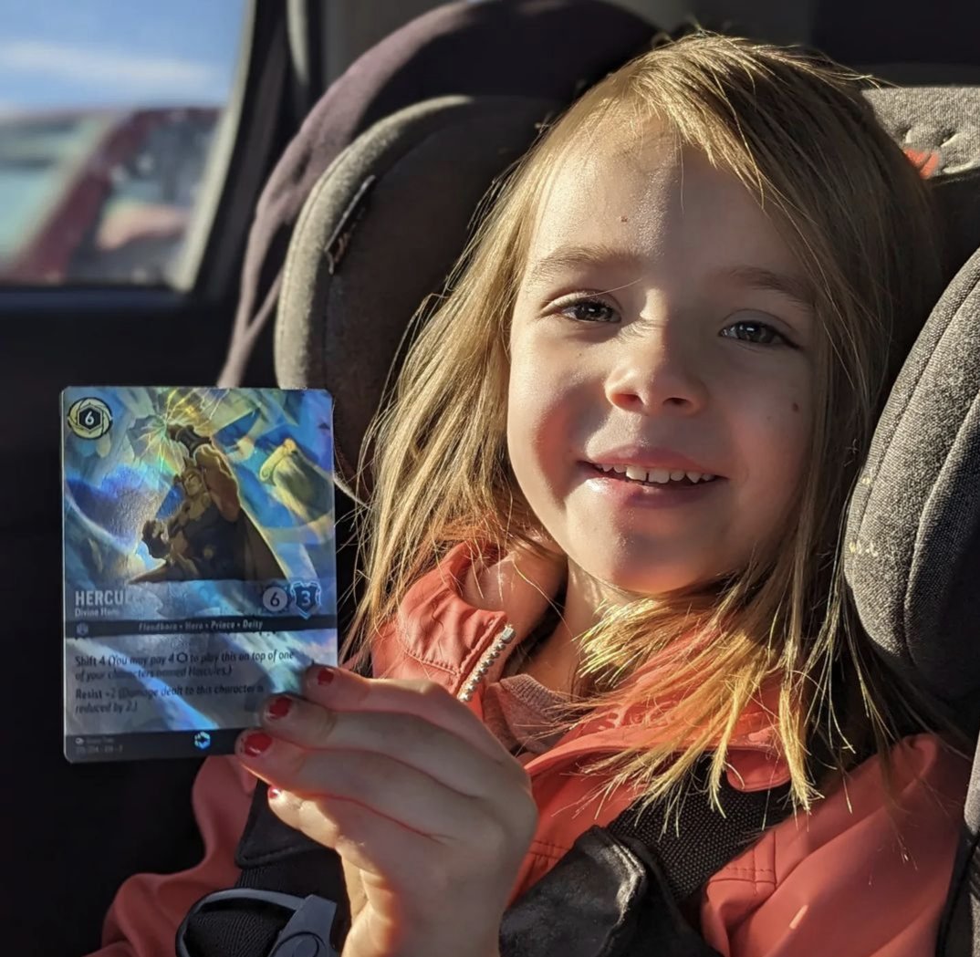 The cutest little card collector ❤️❤️ #lorcana #disney #enchantedcards