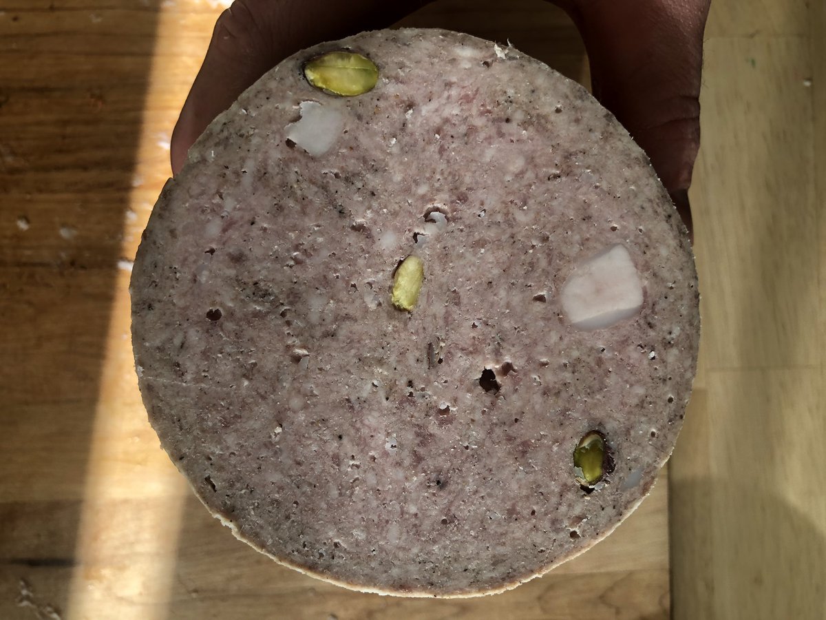 tmcel's tweet image. First attempt at salami cotto and mortadella. Gotta stuff them a little tighter and dial in the emulsification of the mortadella but the flavor is on point. These lack the pink brightness once cooked since I don’t use nitrates.