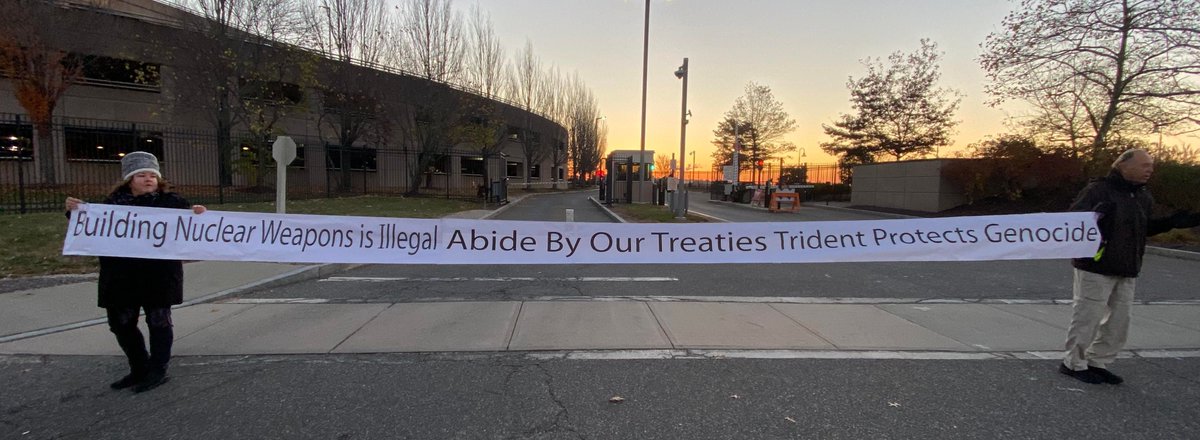 Protesters blocked the two gates of Electric Boat in Groton, CT on Monday.  They wheat pasted Article 6 of the Nuclear Nonproliferation Treaty to both entrances.  9 were arrested and 2 others cited.   The court date is Nov 27.