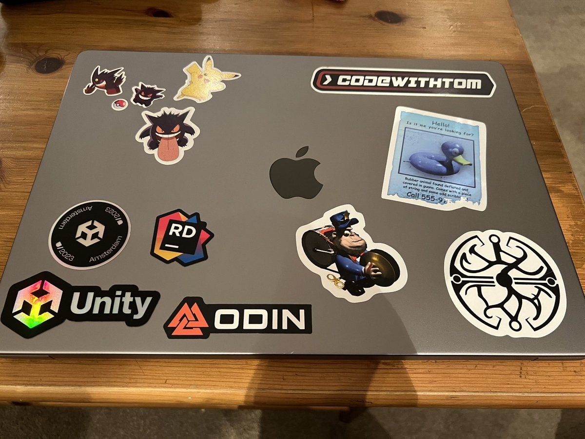 codewithtom's tweet image. Laptop has new swag after #Unite2023!  Shoutouts to @Odin_Inspector and @JetBrainsRider!