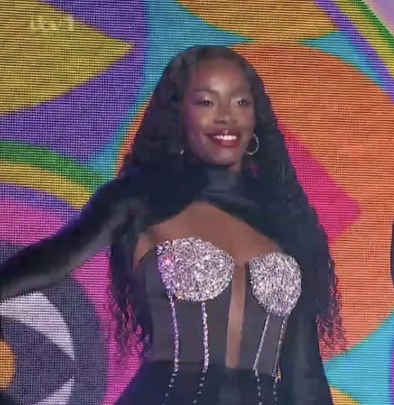 dailystar's tweet photo. Big Brother's AJ Odudu sizzles in corset and thigh-split skirt during live final #bigbrother #BBUK #Bigbrotheruk #bbfinal
https://t.co/Ccb5CPwwp5 https://t.co/g4nbOT9xSa