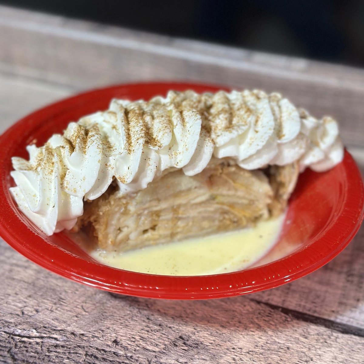 The perfect winter dessert? Apfelstrudel with vanilla sauce and whipped cream, topped with a sprinkle of cinnamon 🧁🍎🤤 

Try this classic mouthwatering dessert at Bryant Park Winter Village anytime from now until the New Year 😍🫶🏼 

 #bryantparkwintervillage  #apfelstrudel