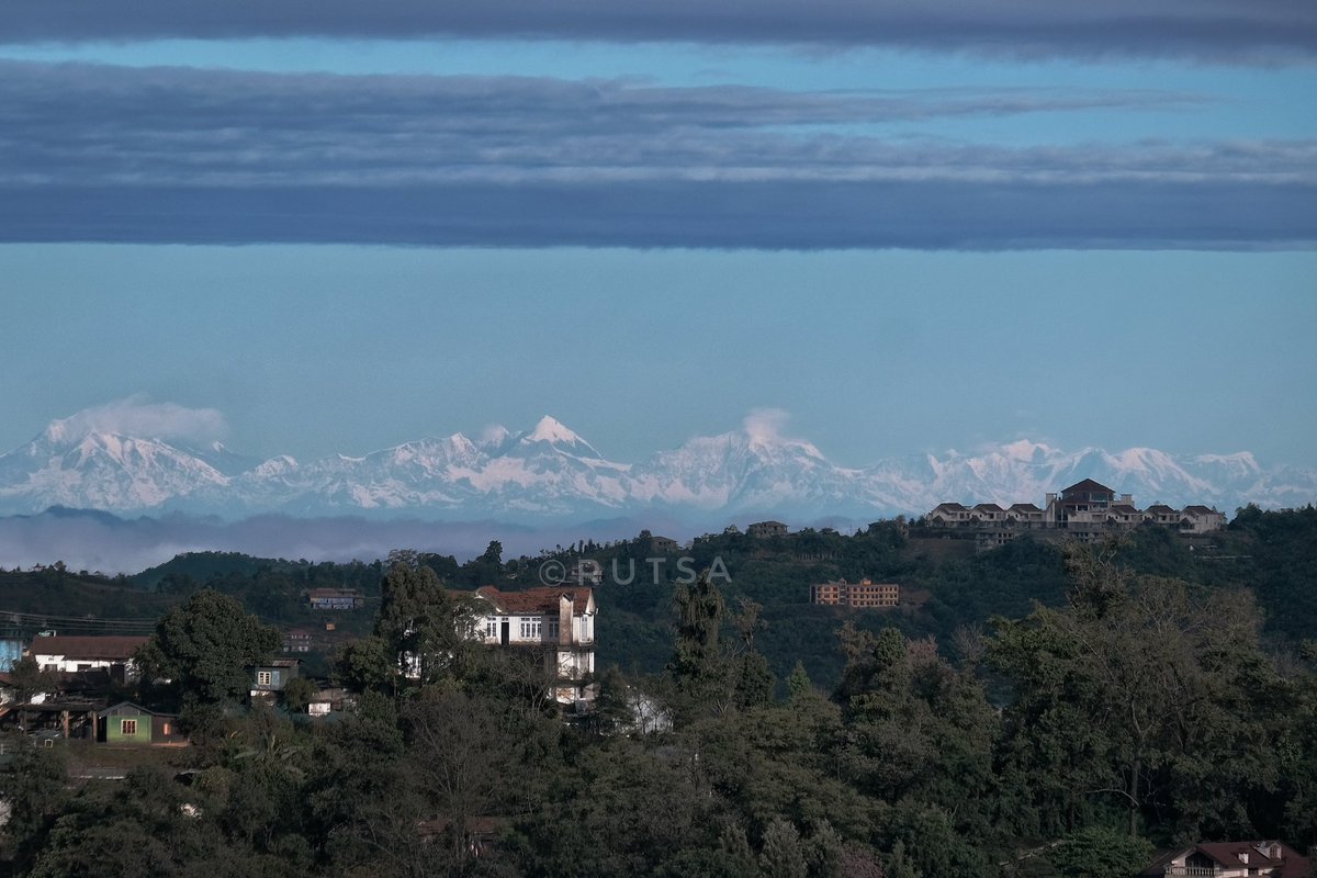 Himalayan range as seen from Christ King Church, Kohima Village.

In the foreground is the Kohima High Court Complex