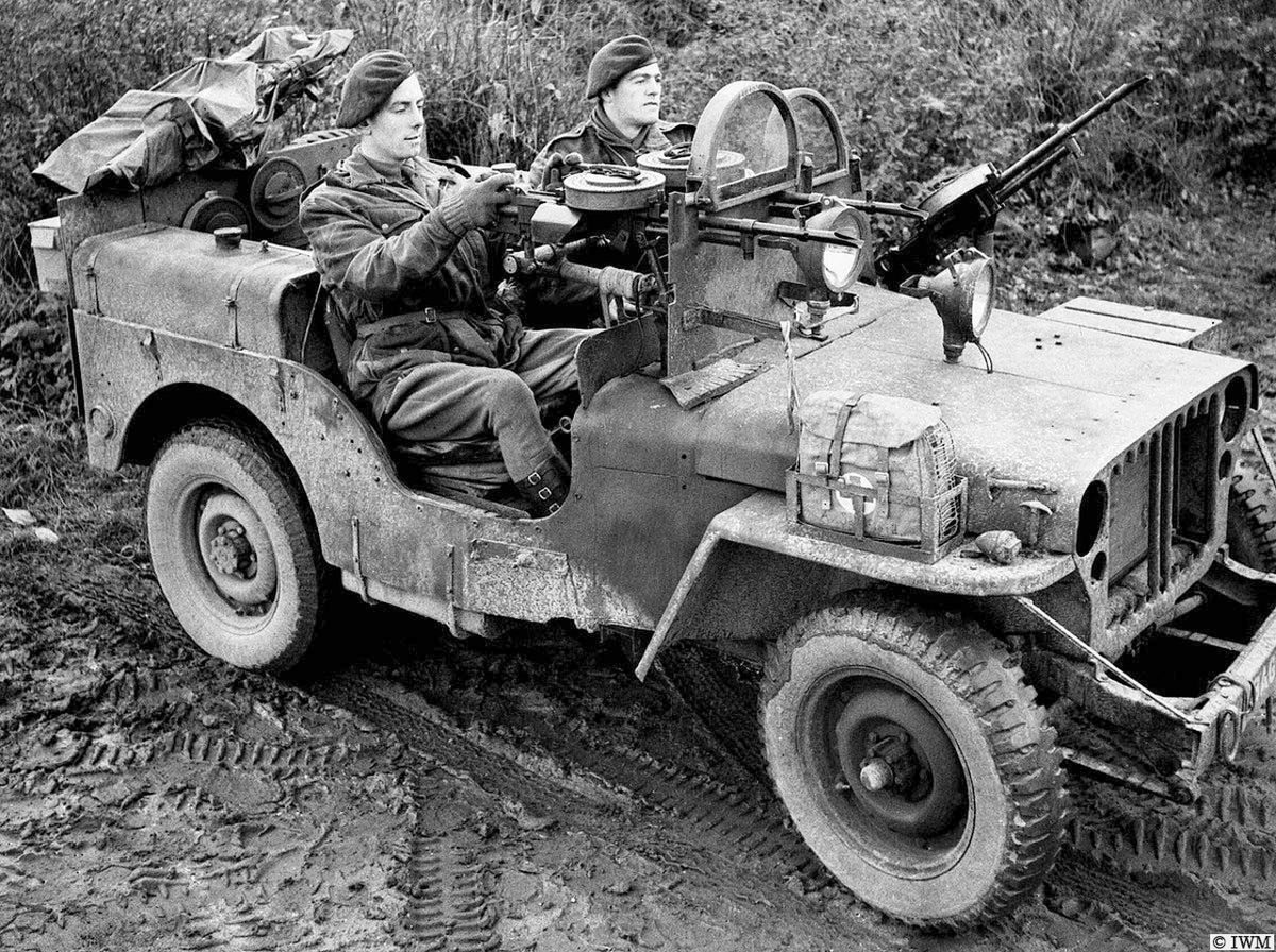 #OTD in 1944, Geilenkirchen area, Germany. Sergeant A. Schofield and Trooper O. Jeavons from 1 SAS. The jeep is armed with five Vickers 'K' guns, self-sealing tanks and fitted with armoured glass shields. #WW2 #HISTORY