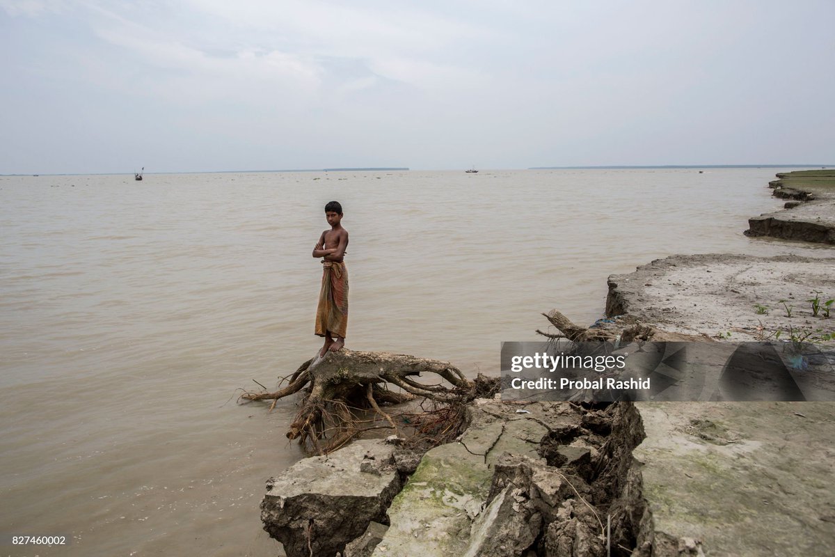 Enayet (12) stands on the bank of #MeghnaRiver where his home lost due to erosion in #BholaIsland, 🇧🇩. The #BholaDistrict is located in the southern part of #Bangladesh. The southern part of 🇧🇩 is known to be especially vulnerable. 

#SaveBholaIsland c
#BholaIslandToCOP28