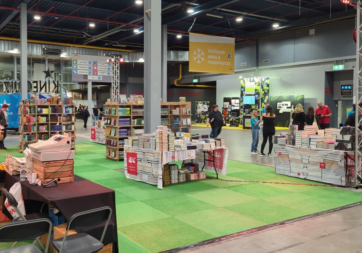ABCBooksNL's tweet photo. Day 1 of @dutchcomiccon is ON! ๐๐ Here's a quick pic of our little book haven this morning, just before the doors opened and the madness started. Come get your book fix at stand 9.11 in the Comics Hall! #ABCintheWild #ABCatDCC https://t.co/7iJpJUpX7b