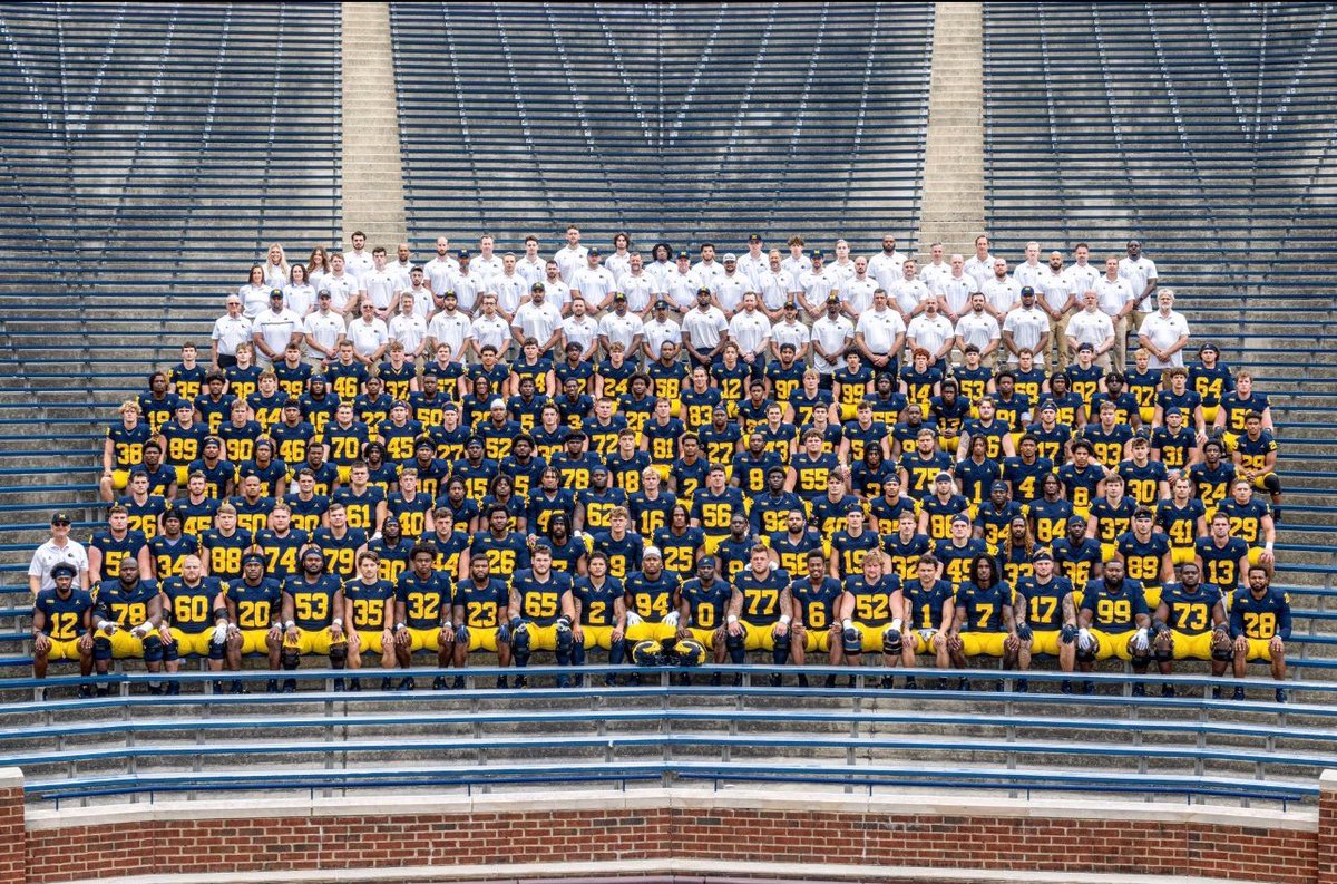 THEREDRANGER3's tweet photo. Team 1                                   Team 144

                               🤝🏻

The University of Michigan will be the first College Football program 

To reach 1,000 wins 

Today we will celebrate the history of the greatest University in the World 

Its great to be a Michigan Wolverine 

#GoBlue