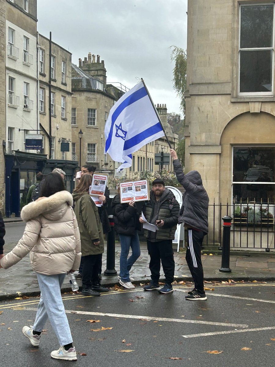 AlnaouqA's tweet photo. This was an Israeli protest today in Bath. 6 people. One the these people approached me today. I told him that Israel killed 21 members of my family. I asked him if he could sleep at night knowing that Israel killed 6000 Palestinian kids. “I sleep very well,” he responded. https://t.co/E4jX6bFRv3