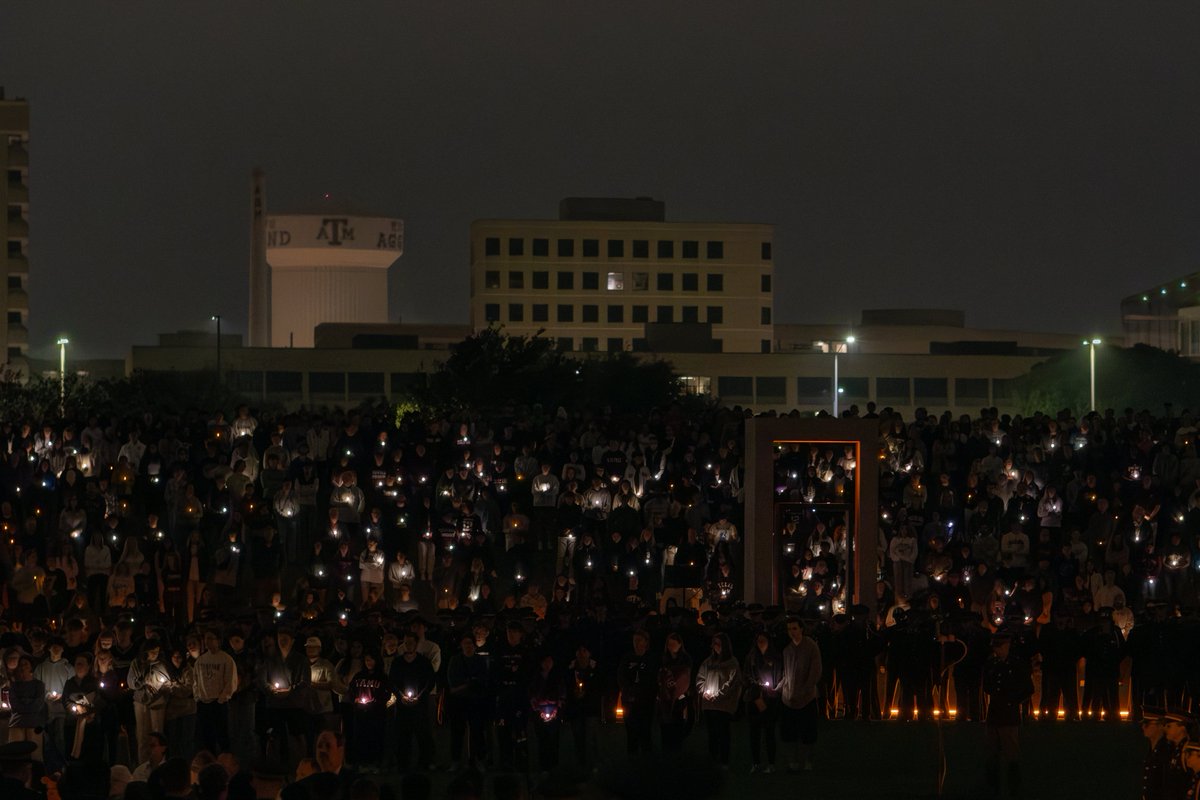 TAMU's tweet photo. This morning at 2:42 a.m., thousands of Aggies gathered at the Bonfire Memorial to remember the twelve we lost 24 years ago. https://t.co/YbC71pHcLn