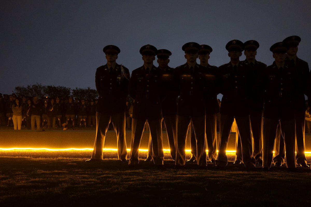 TAMU's tweet photo. This morning at 2:42 a.m., thousands of Aggies gathered at the Bonfire Memorial to remember the twelve we lost 24 years ago. https://t.co/YbC71pHcLn