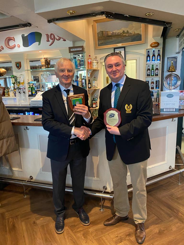 President Karl O'Neill and Jerome Mullane, President of Newcastlewest exchanging club plaques ahead of the game today.