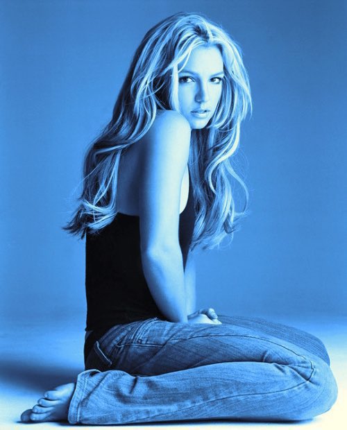 PopCulture2000s's tweet photo. 20 years ago, britney spears released ‘in the zone’… a timeless album. https://t.co/hxc0dp85tE