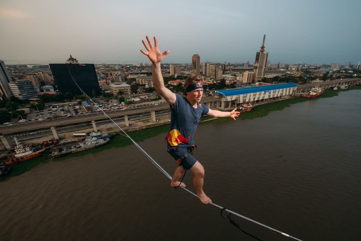 jidesanwoolu's tweet photo. Lagos is the epitome of creativity at its finest and we are saying well done and congratulations to @JaanRoose , the Guinness World Record holder, who has captured the Perfect Lagos Selfie while walking in the sky from Sterling Towers to the Onome Rig. 

His expertise in slack-lining, blending balance training, recreation, and moving meditation is beautifully showcasing our city's vibrant spirit. Capturing the beauty of our skyline against the backdrop of the Blue Line Rail is an admirable feat. 

Partnering with the Lagos Safety Commission, this project highlights the splendour of Lagos State. This is one of many recent successful projects with the @redbull team which include partnering with the Lagos State Government through LASPARK, renovating Ndubuisi Kanu Park's basketball court and recently creating the Lagos Encourage Park in Ikoyi.