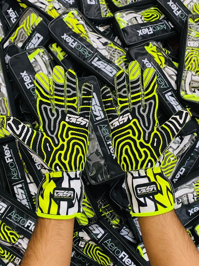 gomezsimracing's tweet photo. Some factory pics of our new GSI AeroFlex gloves! First up the “Interlock Logo” glove. We will begin with 4 long glove designs and 1 short glove in the line up. Highly breathable, highly flexible with each design having a unique grip design! 🥳 https://t.co/m1kt2hr5BV
