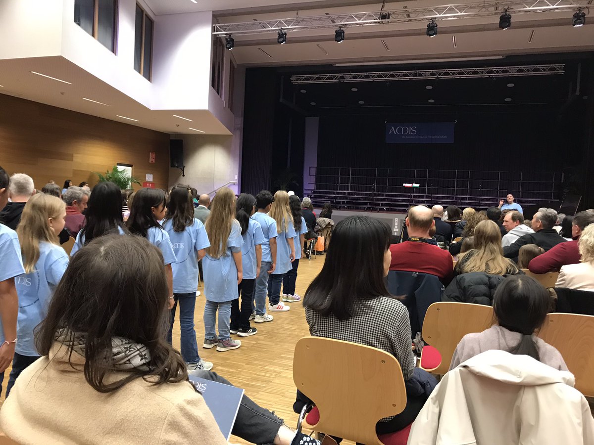 ISLDP_Lower's tweet photo. Third and final day of the AMIS choir festival @ISLuxembourg with the students performing for an assembled audience of parents, children and adults present in the auditorium and via livestream #islconnects #islthinks https://t.co/elp0iSHzPK