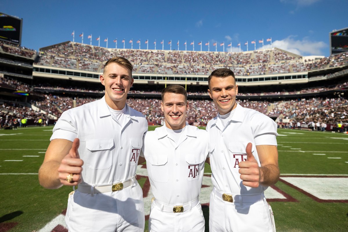 TAMU's tweet photo. Thanks and Gig 'em to our Senior Yell Leaders Trevor Yelton ’24, Ethan Davis ’24, and Thomas Greve ’24, who are leading the #12thMan at Kyle Field for the last time today! https://t.co/u7Y7xS84D6
