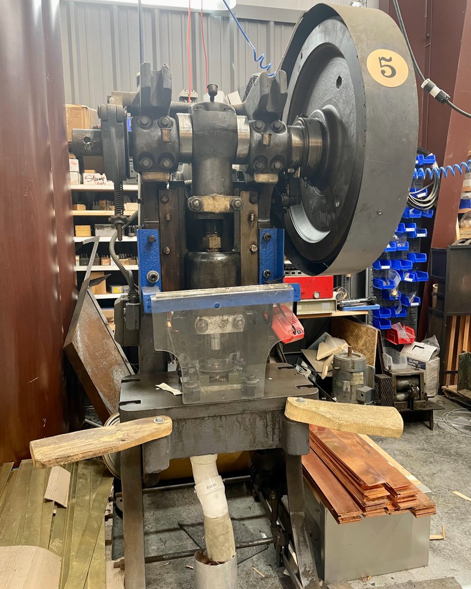 Shop Tour Saturday: This is one of our blanking presses, used to punch out circular or irregularly shaped coin blanks (or planchet if it has a raised rim) out of flattened metal sheets. We often end up making our own tooling since many of the items we use aren't made commercially