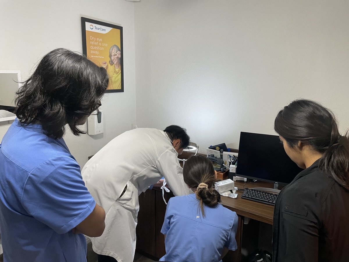 As part of the ⁦@OCEyeProject⁩ clinic today in #YorbaLinda, Dr. Alexander Bui, #retina specialist at #Kaiser LA, is teaching ⁦@KPMedSchool⁩ students the art of ocular suturing on a model eye. #teaching #ophthalmology #optometry #vision #sight ⁦@KPSCALnews⁩