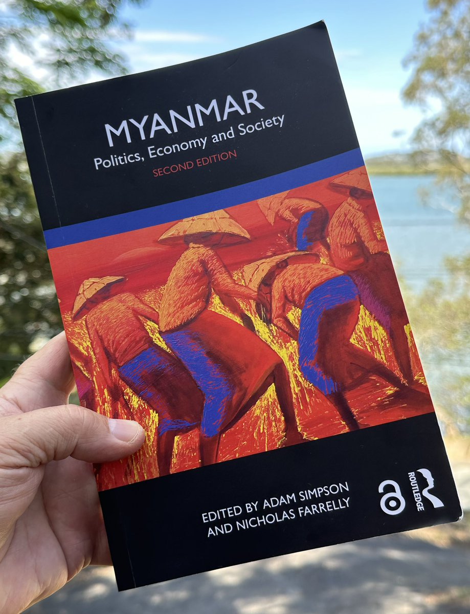 AdamJSimpson2's tweet photo. Hard copies have arrived! New Routledge edition of ‘#Myanmar : Politics, Economy &amp; Society’. Thanks to @ian_thukhuma for donating the wonderful cover painting by Dawei Lay. A stunning image. Entire volume  is available FREE via #OpenAccess online too. #WhatsHappeningInMyanmar https://t.co/IFr1ZjkT65