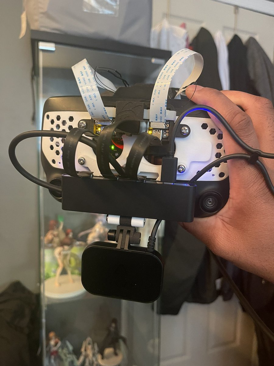 Sergster1's tweet photo. Was supposed to get “glamour” shots of my Index with EyeTrack VR earlier but ended up breaking one of my semi-custom USB-C cables. Better late than never! It’s a fun and relatively cheap mod! #ETVR #VRChat https://t.co/mKKbUeAHhe