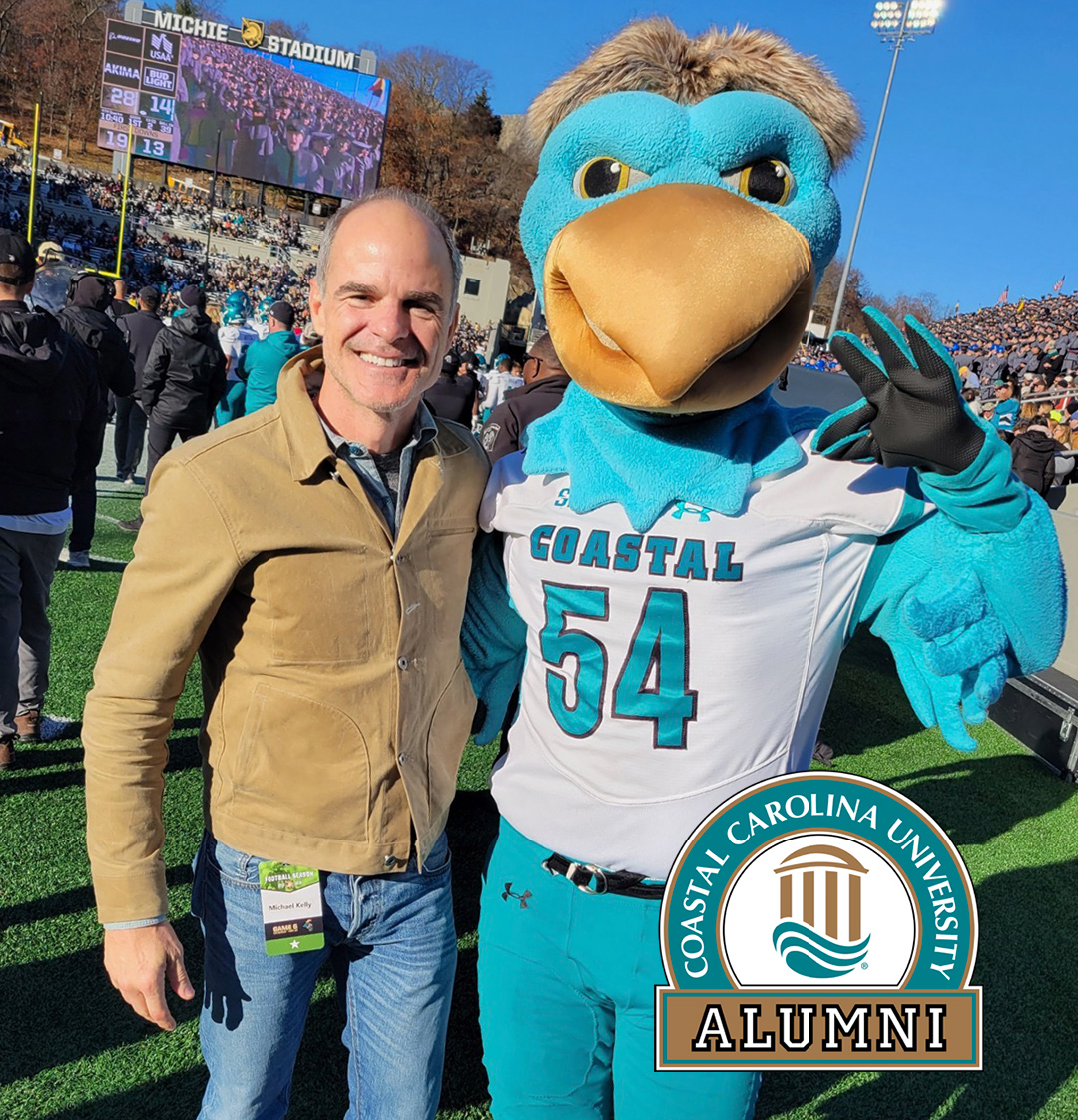CoastalAlumni's tweet photo. 🤩 Michael Kelly ’92, actor, producer, and proud #CCU alum on hand to support our Chants in West Point, NY! It didn't end as we had hoped, but so proud of our men! #ccualumni @CoastalFootball @CCUChanticleers @michaeljkellyjr https://t.co/1Nj83unnNN