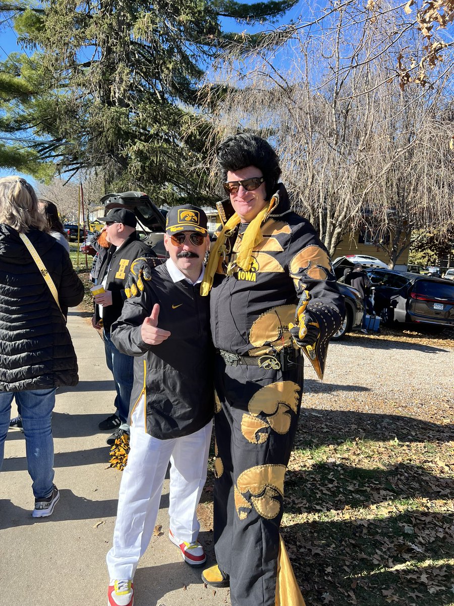 itsajefference's tweet photo. Is it really a @HawkeyeFootball tailgate if you don’t take a picture with @HawkeyeElvis? https://t.co/pbddnALCDE