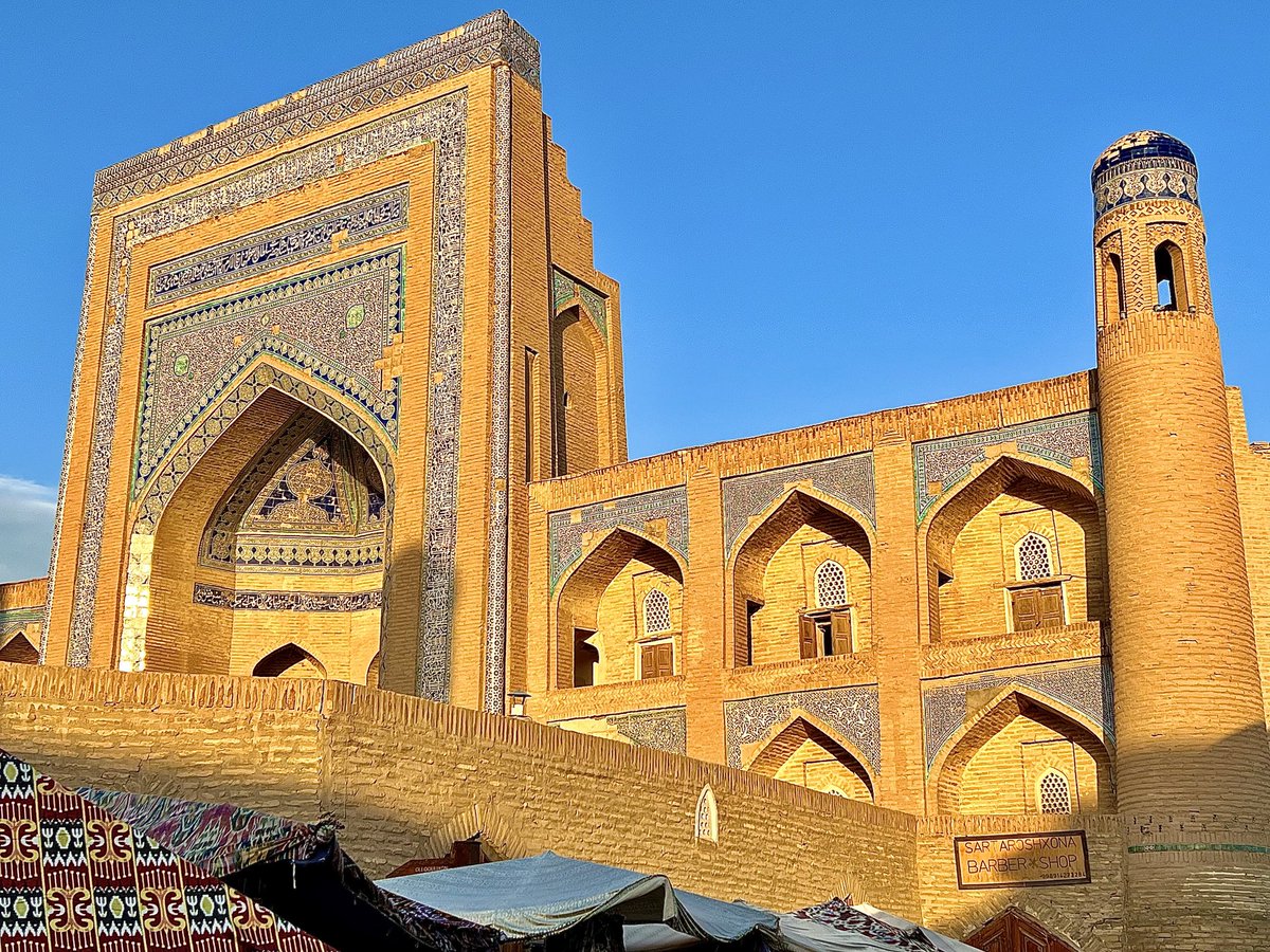 stevewright64's tweet photo. Madrasah of Alla-Kuli-khan built 1834-1835 in architecture of the Khorezm style of the late Middle Ages. #streetphotographer #khiva #uzbekistan #travel #centralasia #silkroad #itchankala #photojournalist #mosques #minarets #madrasahs #allakikhan #formersovietunion #architecture https://t.co/ZlE9gLMbWL