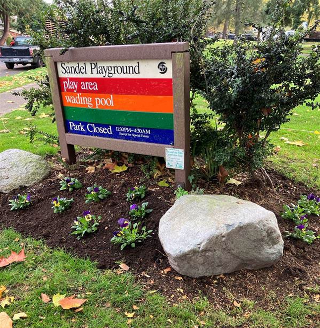 Beautifying our parks happens all year round. This week gardeners planted fall and winter pansies around our iconic rainbow signs. 🌼 #ParkProudSeattle #SeattleShines