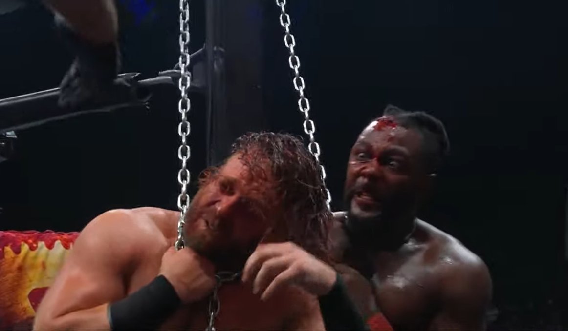 SeanRossSapp's tweet photo. Swerve HANGS Hangman to win. One of the most insane matches I've ever seen https://t.co/FjA2rF99Vx