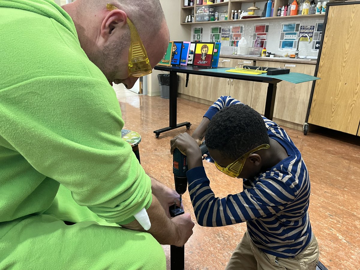 luke_james_86's tweet photo. G2 finishing up teacher room signs. They designed in @AdobeExpress, cut out on the @glowforge, painted letters and rectangles, cut and assembled the L brackets, and glued on the letters. It's been a fun project with lots of new skills learned! #makered #thisisdais #issedu https://t.co/NiEWx9qbQB