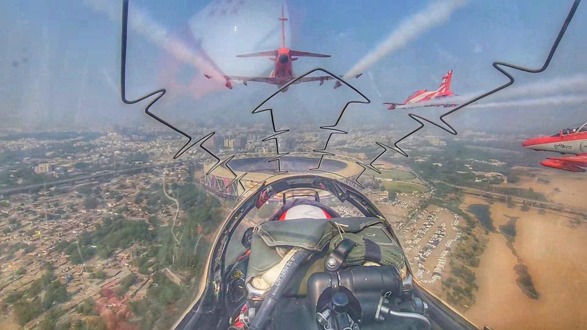 InfoGujarat's tweet photo. Spectacular View of the Narendra modi stadium from the cockpit 🏟 

@Suryakiran_IAF 

#INDvsAUSFinal #ICCCricketWorldCup 🏆 https://t.co/tmBEIF1sxw