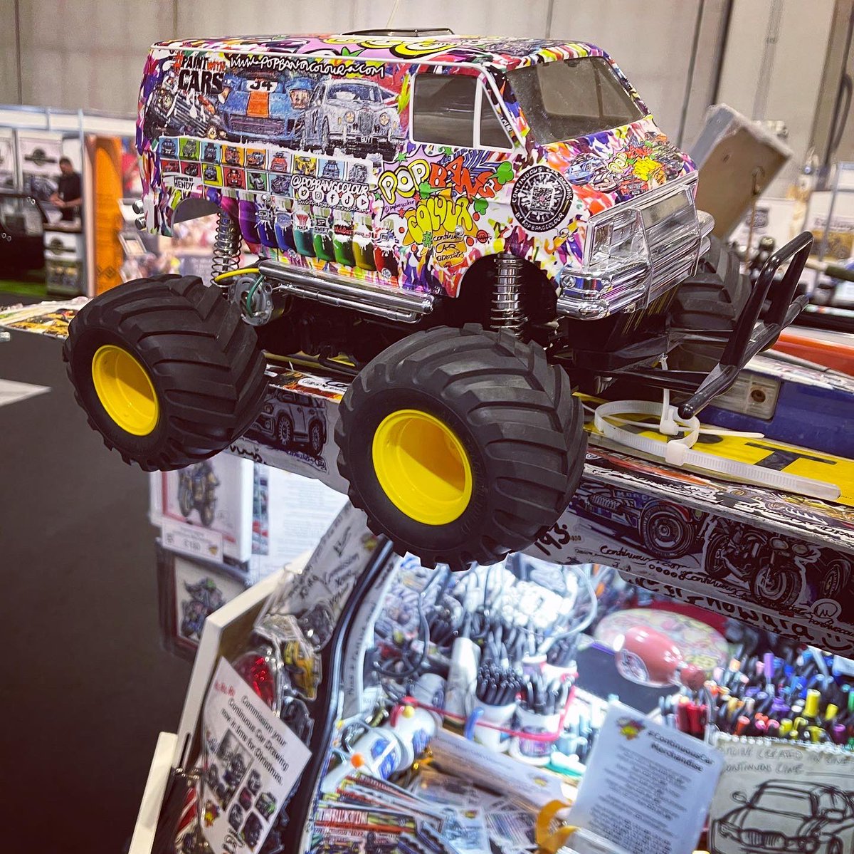 Popbangcolour's tweet photo. Day 2 of @motorcyclelive is go! Come say hi in hall 3 where you’ll find Mother Cook &amp; I 

The @asecustommc is lit up by the POPBANGCOLOUR missionneonsigns with the Latitude Tents on top of the van. 

The @GarageStyleLtd flooring adding some colour to the stand too #MotorcycleLive https://t.co/BH3D6hKMxu