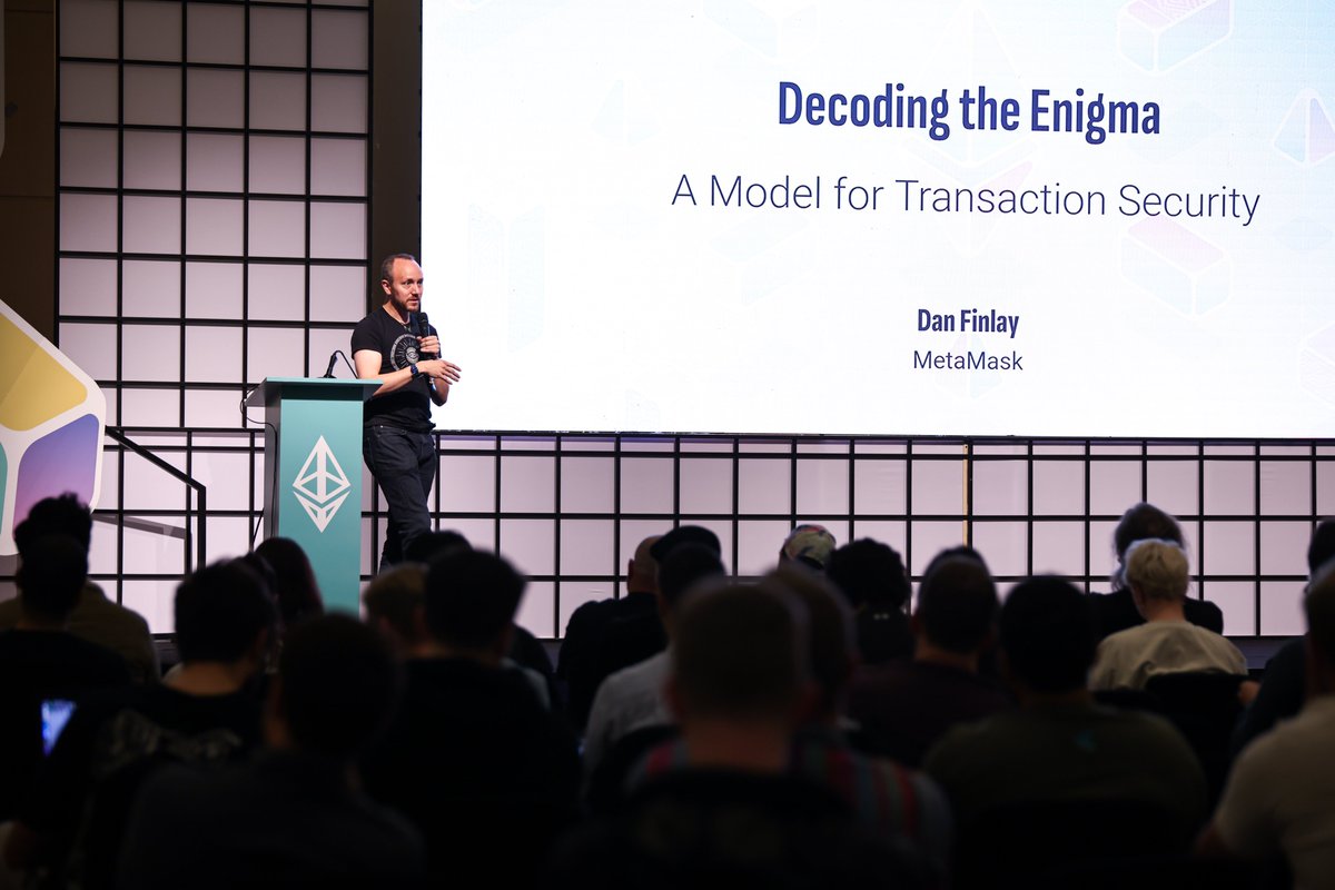 We got some photos from the event photographer of <a href="/EFDevconnect/">EF events</a> and will share them over the next days.
We start with a nice photo of <a href="/danfinlay/">Dan FinIay</a> of <a href="/MetaMask/">MetaMask.eth 🦊</a> from his talk "Decoding the Enigma"
You can watch the talk on <a href="/streameth/">StreamETH</a> 
app.streameth.org/devconnect/wal…