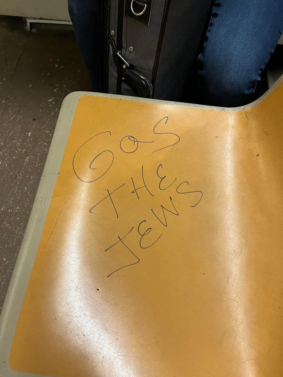 StopAntisemites's tweet photo. NYC - these atrocious antisemitic writings were spotted yesterday on the Q train @NYCTSubway 

The handwriting appears to be from a female with a Cyrillic language background such as Russian. https://t.co/9h22K0PsWz