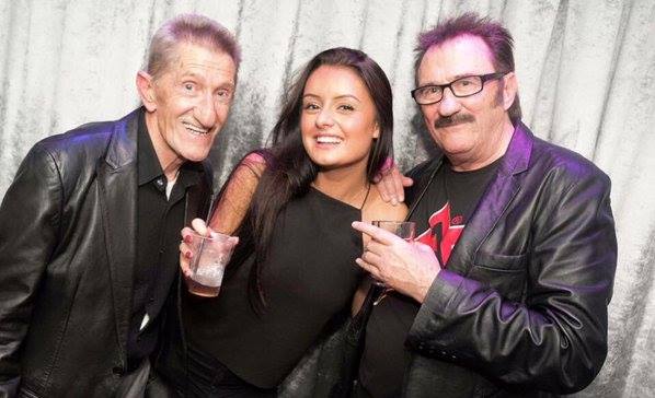 FB tells me it's 8 years ago today that I first saw this picture of the Chuckle Brothers with a restauranteur whose arm looks like Barry Chuckle has put a big severed cock in her drink. RIP Barry.