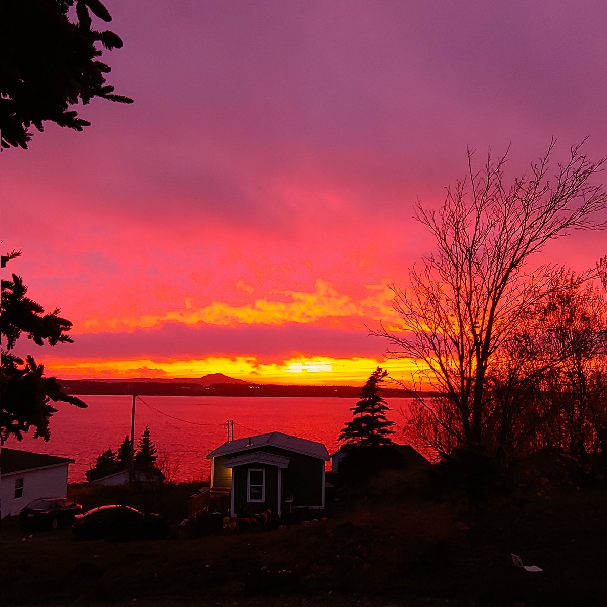 kara2816's tweet photo. Quite the sunset after a stormy, windy day in Greens harbour. #nlwx #newfoundland @EddieSheerr @CBCNL https://t.co/F7JINHwxbH