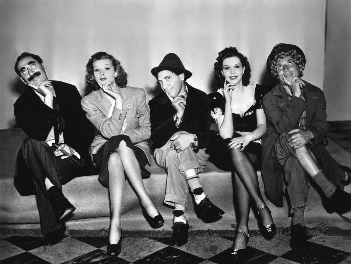 Groucho Marx, Lucille Ball, Chico Marx, Ann Miller and Harpo Marx on the set of Room Service (1938)