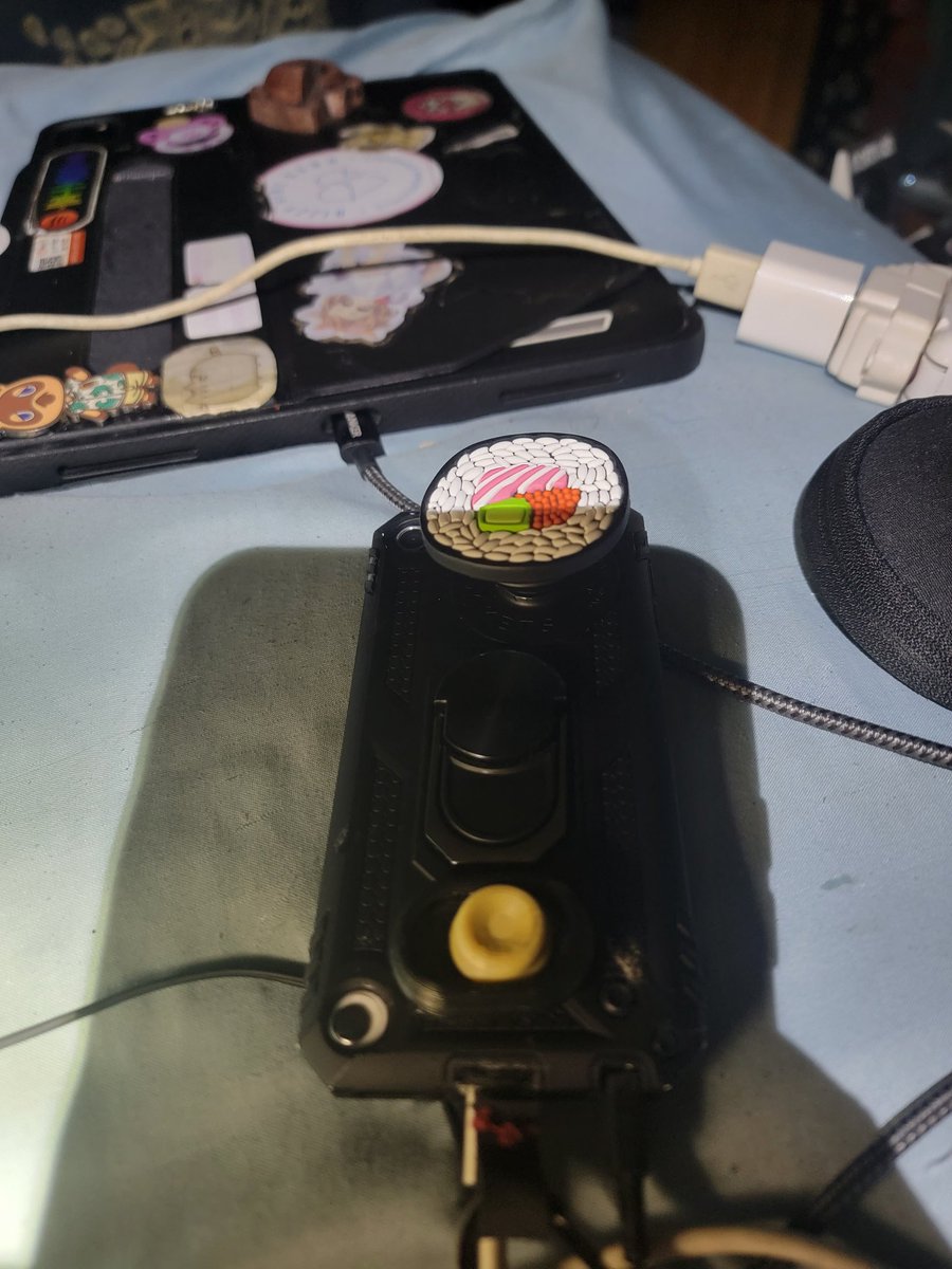 PixelGirlArt's tweet photo. Made a very janky, but, useful and unique case customization for a case for my iPod Touch 7th gen. Seeing as I didn't really need the lanyard hole, I decided to add an eye there in the extra space on top of the lanyard strap inside, turning the iPod into an eyePod.  @PodsDank https://t.co/hgMLWoBOvl