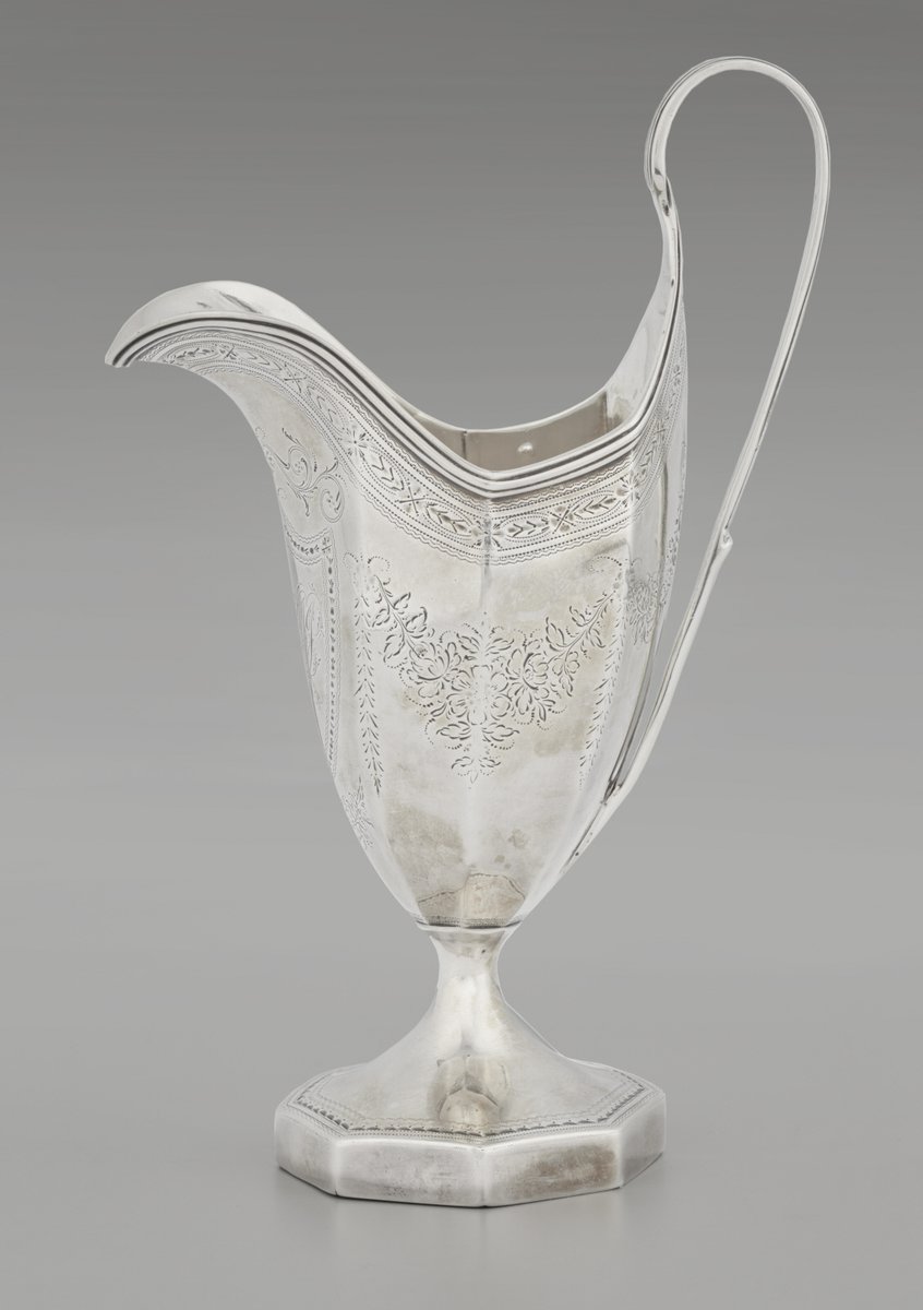 English.
Hester Bateman (1708–1794)

Cream Jug, 1789-90.
Hester inheirited her husband’s silversmithing tools in  1760,continuing the business with her sons for 30 years. They made this cream jug, with faceting, engraving, interlaced monogram.

©️Clark Art Institute. #WomensArt