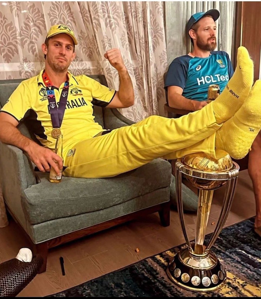 This picture is going viral on Indian social media, people are abusing Marsh and asking him to respect the trophy. First of all stop forcing your culture on others, secondly, it is their trophy, they have earned 6 of them, so whether they shit in it or pee on it, it is their…