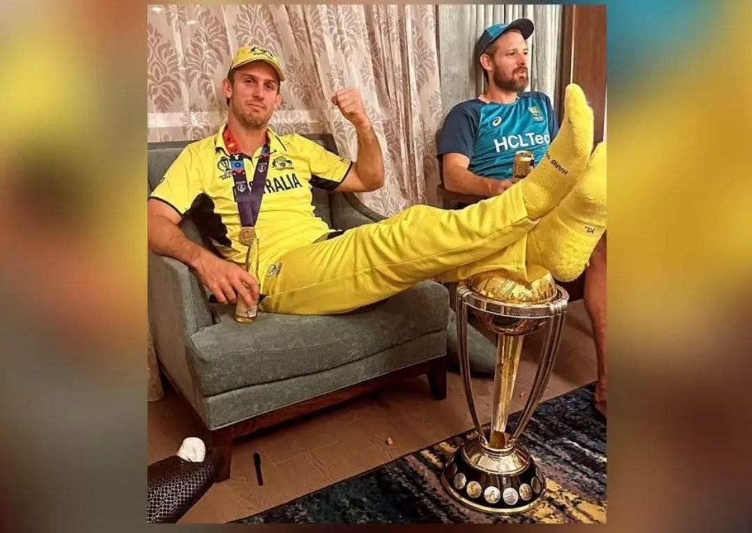 manntripathy's tweet photo. @BCCI Australian cricket player Mitchell Marsh is so arrogant, he has kept the World Cup under his feet. Australia Cricket Board must take some action against this player and Australia Cricket Board should apologize for this. https://t.co/3rLtKHlwG6